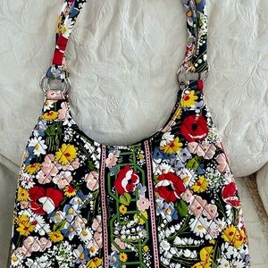 Retired design by Vera Bradley never used pristine condition, purse & wallet.